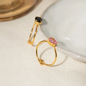 Minimalist 18k gold stainless steel rings with pink and black oval zircons on ceramic
