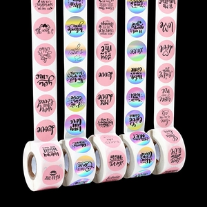 Detail of five Valentine stickers rolls with pink and holographic heart designs