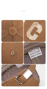 Detailed close-up of brown cotton baseball cap showing 3D embroidered C logo and metal buckle