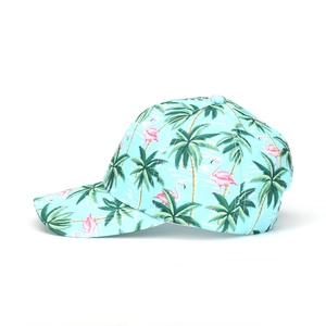 Side view of a light blue baseball cap featuring pink flamingo and palm tree patterns