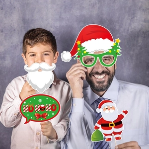 Christmas party photo booth props set with festive paper cutouts held by models