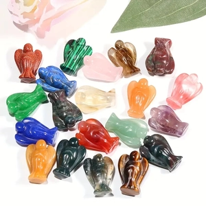 Hand-carved natural crystal angel statues in various colorful gemstones and minerals