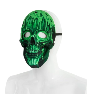 Detail of neon green and black Halloween skull mask with dripping paint texture on white model