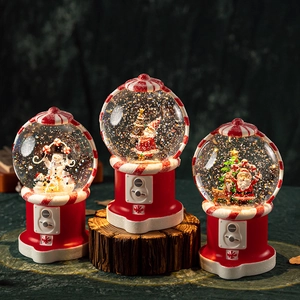 Christmas crystal ball music box with Santa and snowman in a red gashapon machine design