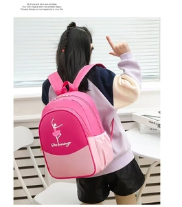 Rear view of pink ballet dance backpack with girl silhouette and Dancing print detail