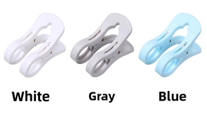 Three large plastic windproof quilt clips in white, grey, and blue colors