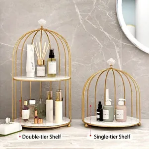 Luxurious gold birdcage organizer rack with marble shelves for vanity perfumes