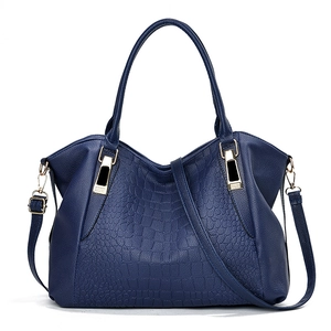 Classic dark blue crocodile embossed tote bag with gold hardware and shoulder strap