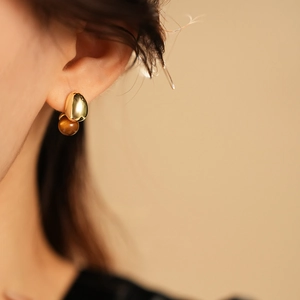 French vintage style earrings with golden metal and brown faux tiger eye stone sphere