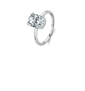 Macro shot of S925 sterling silver stamp and oval-cut gemstone on four-prong ring