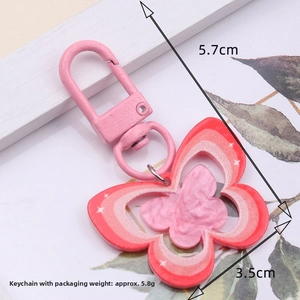Pink gradient butterfly acrylic keychain with lobster clasp shown with measurements
