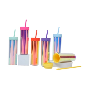 Detail view of colorful iridescent double-wall plastic tumblers with lids and straws