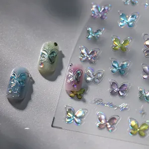 Macro shot of 3D aurora butterfly nail stickers with iridescent embossed textures