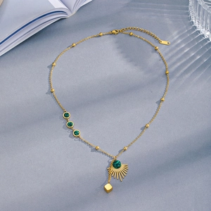 Gold malachite fan-shaped pendant necklace with geometric cube and sunburst sun pattern
