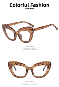 Detail view of stylish tortoiseshell cat-eye glasses frame with sleek marble pattern