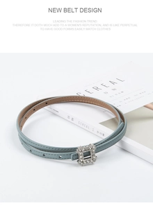 Detailed view of light blue leather thin belt featuring a square rhinestone buckle on magazine