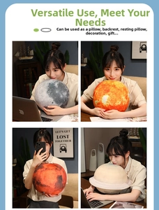 Detail view of 3D planet plush pillows featuring Earth and Saturn in a home setting