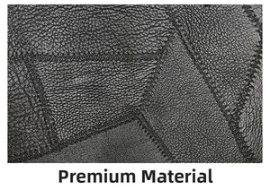 Close-up of black lychee grain leather with vintage patchwork stitching for large tote bag