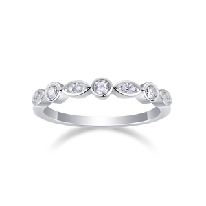 Detailed close-up of a silver eternity ring with round and marquise-cut white stones