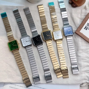 Detailed collection of square quartz watches with colorful dials and metal link bracelets