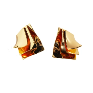 Irregular multilayer geometric golden earrings with wave pattern on white background