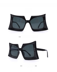 Front and side display of oversized square sunglasses in glossy black finish