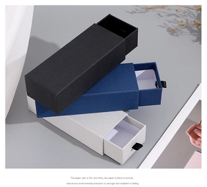 Textured drawer gift boxes in black, blue, and grey for eyewear or cosmetics packaging