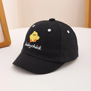Detailed view of yellow chick embroidery and babychick text on black cotton baby hat