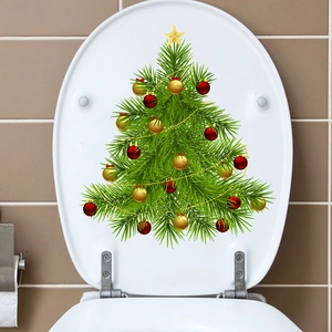 Detailed Christmas tree decal with gold stars and red balls on a white toilet lid