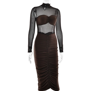 Detail view of brown mesh dress with sheer high neck top and ruched body texture