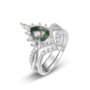 Macro detail of S925 hallmark on a silver ring with pear-shaped moss agate stone
