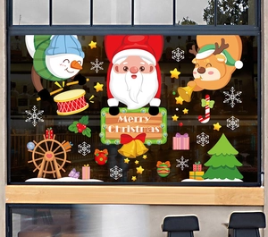 Close-up of Christmas window stickers with Santa, reindeer and snowman on glass