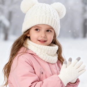 Toddler winter set featuring a white knit hat with double pom poms, scarf, and gloves