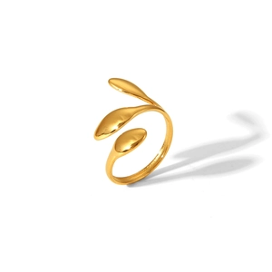 Close-up of a gold adjustable stainless steel leaf ring with a polished minimalist finish