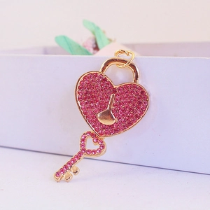 Pink rhinestone heart lock and key keychain in gold finish for handbags and car keys