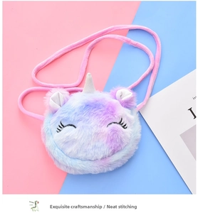 Detail of plush unicorn crossbody bag with rainbow gradient faux fur and embroidery
