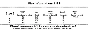 Tableau des tailles détaillé avec mesures pour le pull femme oversize à motifs dorés