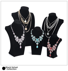 Close-up of five black velvet bust displays for jewelry in the Black Velvet Series