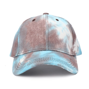Macro detail of six-panel tie-dye baseball cap in blue and brown cotton twill fabric