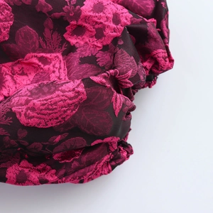 Pink floral jacquard off-shoulder mini dress with puff sleeves and textured fabric