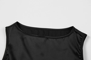 Detailed macro view of the sleek black satin neckline with clean stitching and glossy texture