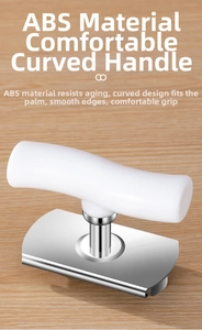 Ergonomic white ABS handle of the stainless steel jar opener on a wooden table