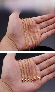 Detail of 18K gold-plated stainless steel O-chain with durable lobster clasp closures