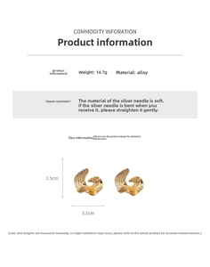 Detailed view of gold twisted wave earrings with alloy and silver needle specs