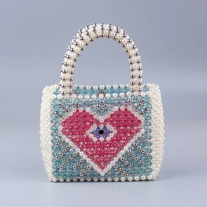 Handmade beaded handbag with pink heart pattern and elegant pearl handle for women