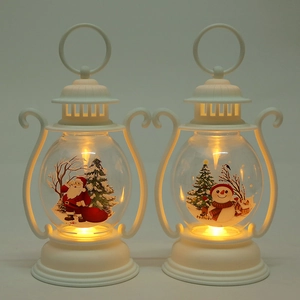 Detail of Christmas lantern set with Santa and Snowman motifs and warm LED lighting
