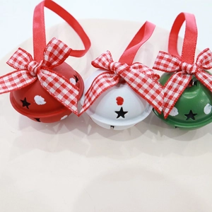 Red white and green 4cm metal Christmas bells with star cutouts and plaid bows