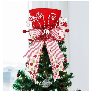 Detail of red velvet Christmas tree topper hat with glitter bow and candy canes