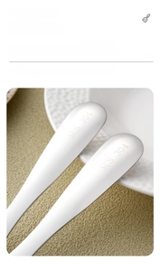 Detail of 304 stainless steel kitchen spatula with SUS 304 stamp and long handle