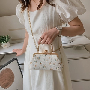 Vintage embroidery shell bag with floral jacquard fabric and elegant pearl handle strap